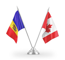 Canada and Moldova table flags isolated on white 3D rendering