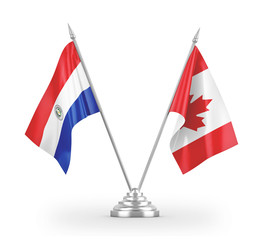 Canada and Paraguay table flags isolated on white 3D rendering