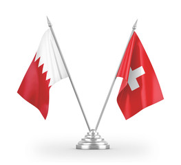 Switzerland and Bahrain table flags isolated on white 3D rendering