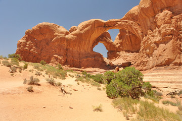 Fototapeta na wymiar Double Arch - close-set pair of natural arches in Arches National Park in southern Grand County, Utah, United States.