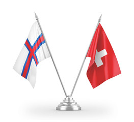 Switzerland and Faroe Islands table flags isolated on white 3D rendering