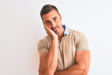 Young handsome man wearing elegant t-shirt over isolated background thinking looking tired and bored with depression problems with crossed arms.