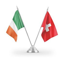 Switzerland and Ireland table flags isolated on white 3D rendering