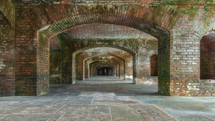 Series of arches with old bricks within Fort Jefferson at Dry Tortugas National Park near Key West, Florida. Old achitecture. Background concept.