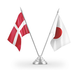 Japan and Denmark table flags isolated on white 3D rendering