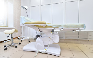 Adjustable chair in the medical office. Automatic chair in the beauty parlor for procedures.