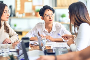 Group of business workers working together at the office