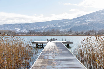 wooden walkway on sapanca lake in winter