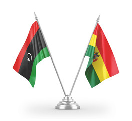 Bolivia and Libya table flags isolated on white 3D rendering