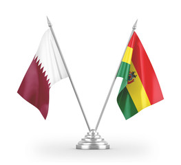 Bolivia and Qatar table flags isolated on white 3D rendering