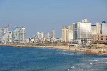 Fototapeta na wymiar Tel Aviv coastline, the hotel area from a low point of view. View of Tel Aviv coastline From Jaffa Port. 