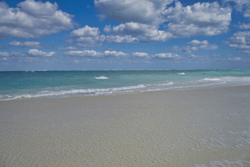 Fototapeta na wymiar Just Sand, Sea and Sky.