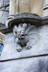 Medieval basrelief with gargoyle in Dublin, Ireland