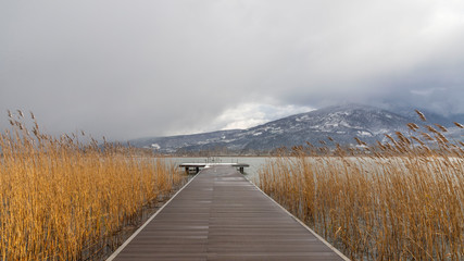 wooden walkway on sapanca lake in winter