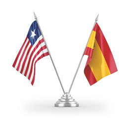 Spain and Liberia table flags isolated on white 3D rendering