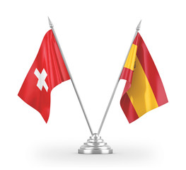 Spain and Switzerland table flags isolated on white 3D rendering