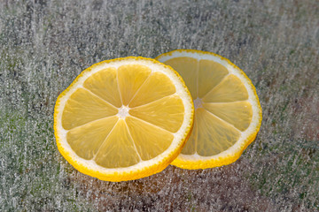 Lemon slices on ice