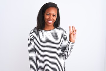 Beautiful young african american woman wearing winter sweater over isolated background showing and pointing up with fingers number four while smiling confident and happy.