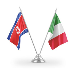 Italy and North Korea table flags isolated on white 3D rendering