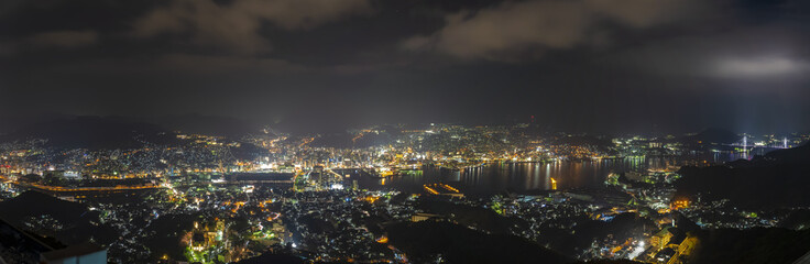 Nagasaki city light up at night. Panorama nightscape from Mt Inasa observation platform deck. Famous beauty scenic spot in the world, the 10 ten million dollar night views. Nagasaki Prefecture, Japan