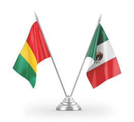 Mexico and Guinea table flags isolated on white 3D rendering