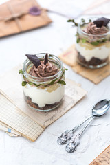 Granola with yoghurt on bright background