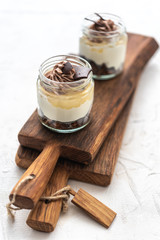 Granola with yoghurt on bright background