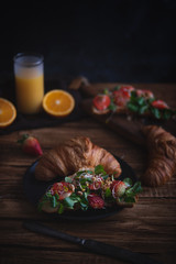 Healthy croissant for breakfast on dark background - 321742838