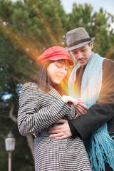 Happy sentimental couple in love bonding with gift. Valentine's day celebration. Man gives the...