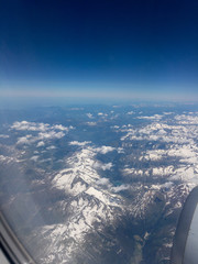 Aerial view of Austrian Alps from an airplane.