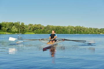 Active healthy lifestyle teens. Boys paddling sport kayak