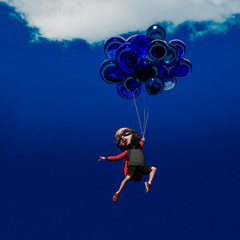 Fototapeta na wymiar little boy cartoon holding and floating balloon