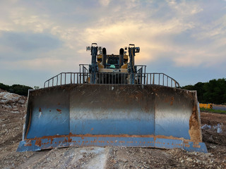 Muddy Caterpillar D11 Bulldozer - Front View at Sunset © Sean