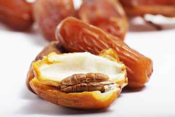 Macro shot of Tunisian dates / Phoenix dactylifera on a white isolated background