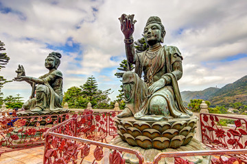 Fototapeta na wymiar Statues at the base of the Tian Tan Buddha (Big Buddha) at Ngong Ping on Lantau Island in Hong Kong