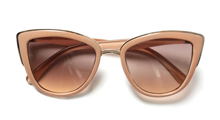 New elegant women's sunglasses isolated on white