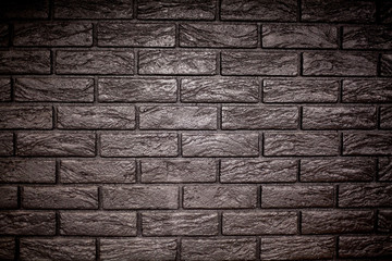 Natural black brick wall with space for text
