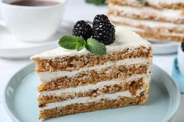 Tasty cake with berries on plate, closeup