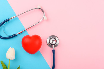 Doctor's Day concept, flat lay top view, stethoscope with red heart