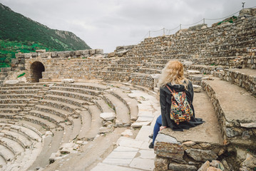 Tourist in the ancient amphitheater of Ephesus