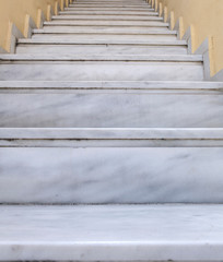 Marble staircase mixed with white and gray.