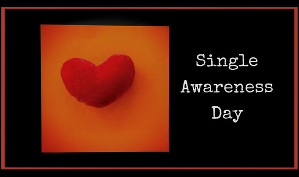 inspired words of single awareness day written on notepaper in dark background
