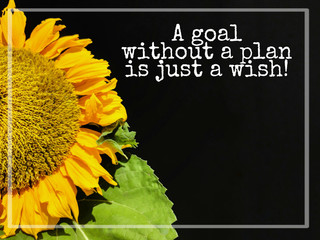 inspirational and motivational quote of a goal without a plan is just a wish with sunflower background