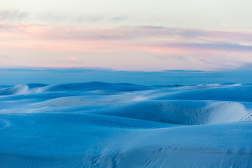 Landscape view of the sunrise in White Sands National Park near Alamogordo, New Mexico.