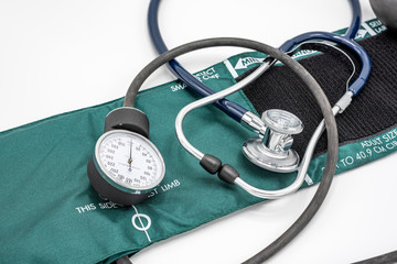 Stethoscope and blood pressure cuff on white 3