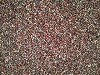 rough uneven surface with a sandy background texture