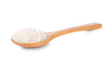 Rice in a wooden spoon on a white background.