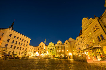 Fototapeta na wymiar Medieval buildings around town square in the evening, Cesky Krumlov, Czech Republic