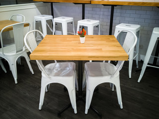 wood table and chair in cafe