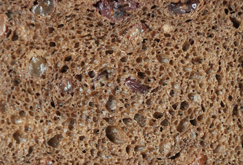The texture of rye bread with raisins.
